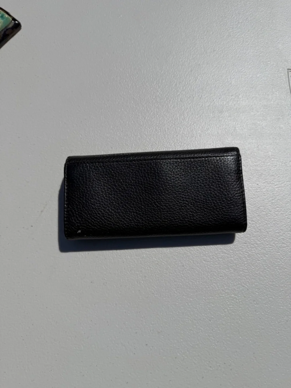 Michael Kors black leather pebbled leather Fulton Carryall wallet